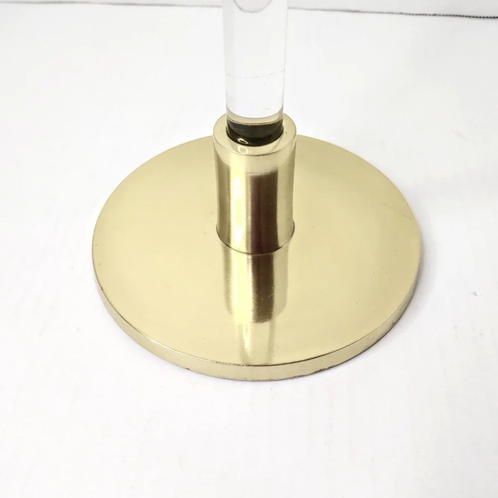 Creative Co-op tall acrylic/gold taper candle holder.